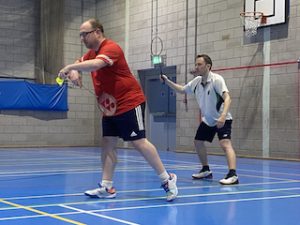 John and harry playing badminton