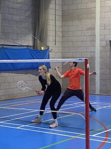 Miranda and Derek playing badminton